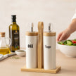 Serrana Glass Oil and Vinegar Ceramic Set — ceramic bottles with easy-pour spouts on bamboo stand