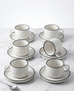 Serrana Glass Speckled Ribbed Tea Coffee Cup Set 6pc — large white ribbed ceramic with dark blue rim and saucer