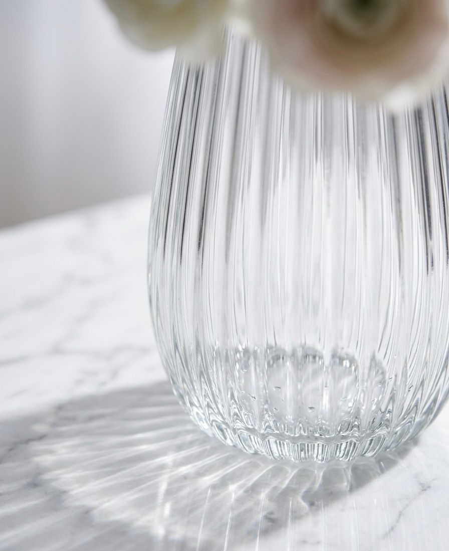 Serrana Glass Celestia Fluted Glass Vase 26cm — precision vertically ribbed clear glass for statement blooms and branches