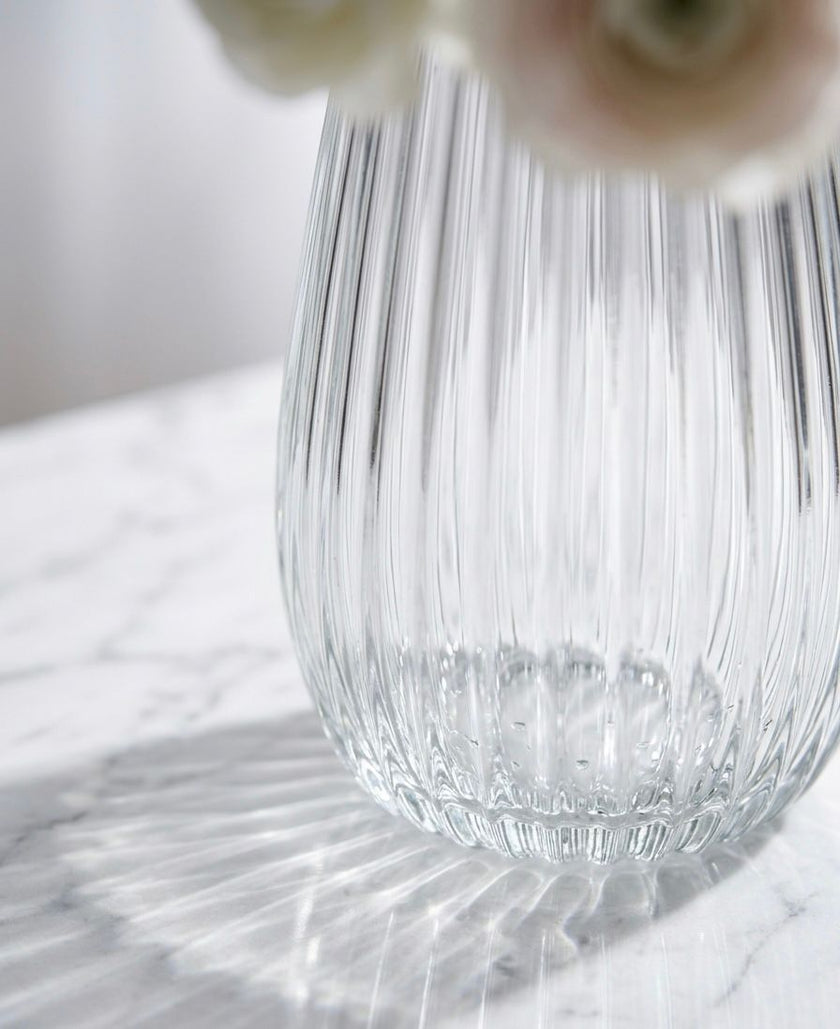 Serrana Glass Celestia Fluted Glass Vase 26cm — precision vertically ribbed clear glass for statement blooms and branches