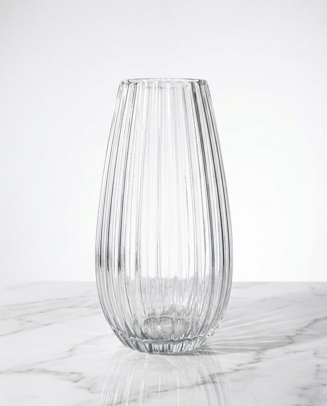 Serrana Glass Celestia Fluted Glass Vase 26cm — precision vertically ribbed clear glass for statement blooms and branches