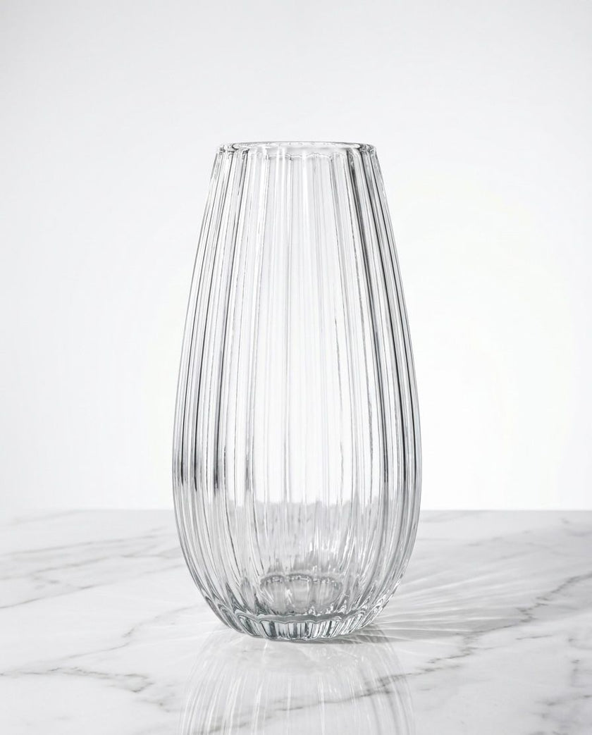 Serrana Glass Celestia Fluted Glass Vase 26cm — precision vertically ribbed clear glass for statement blooms and branches