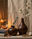 Set of two handcrafted Sidr wood vases — 35cm and 20cm, rich dark grain and natural warmth