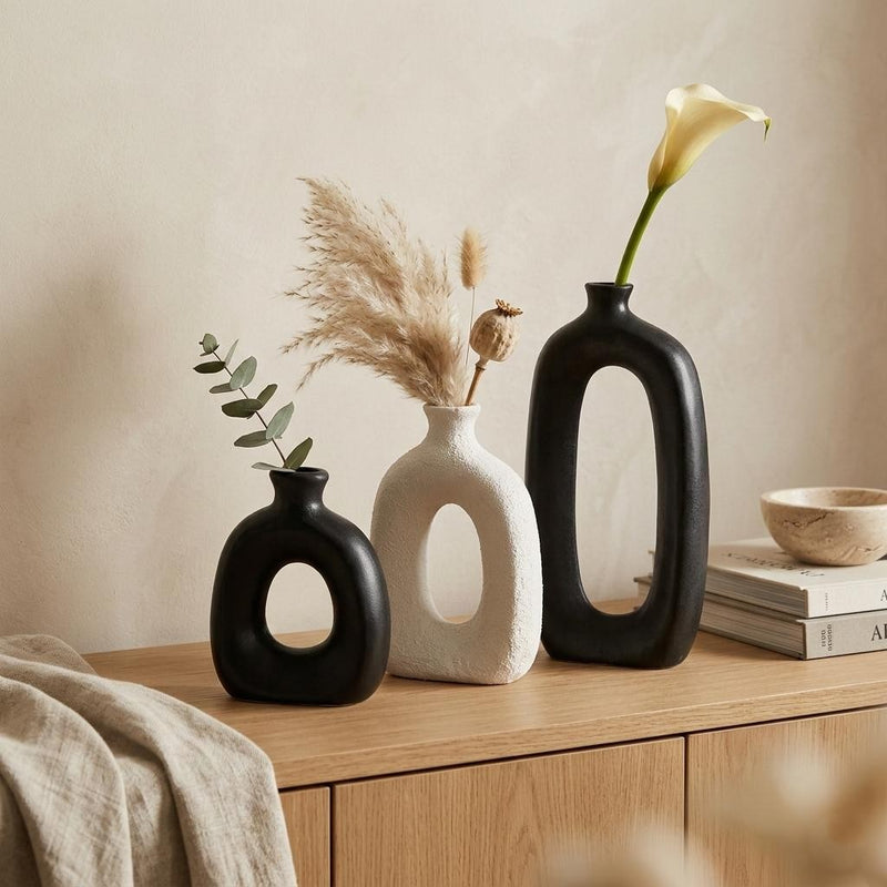 Serrana Glass Modern Cut-Out Oval Pottery Vase — architectural oval cut-out pottery for floral display and interior decor