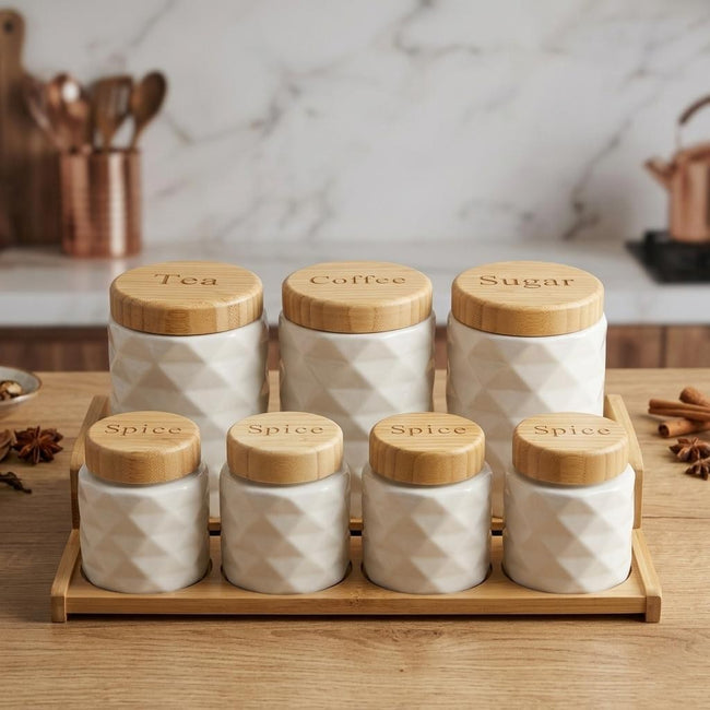 Serrana Glass Prism 7-Piece Countertop Suite — diamond-relief white ceramic canisters with bamboo lids on tiered tray